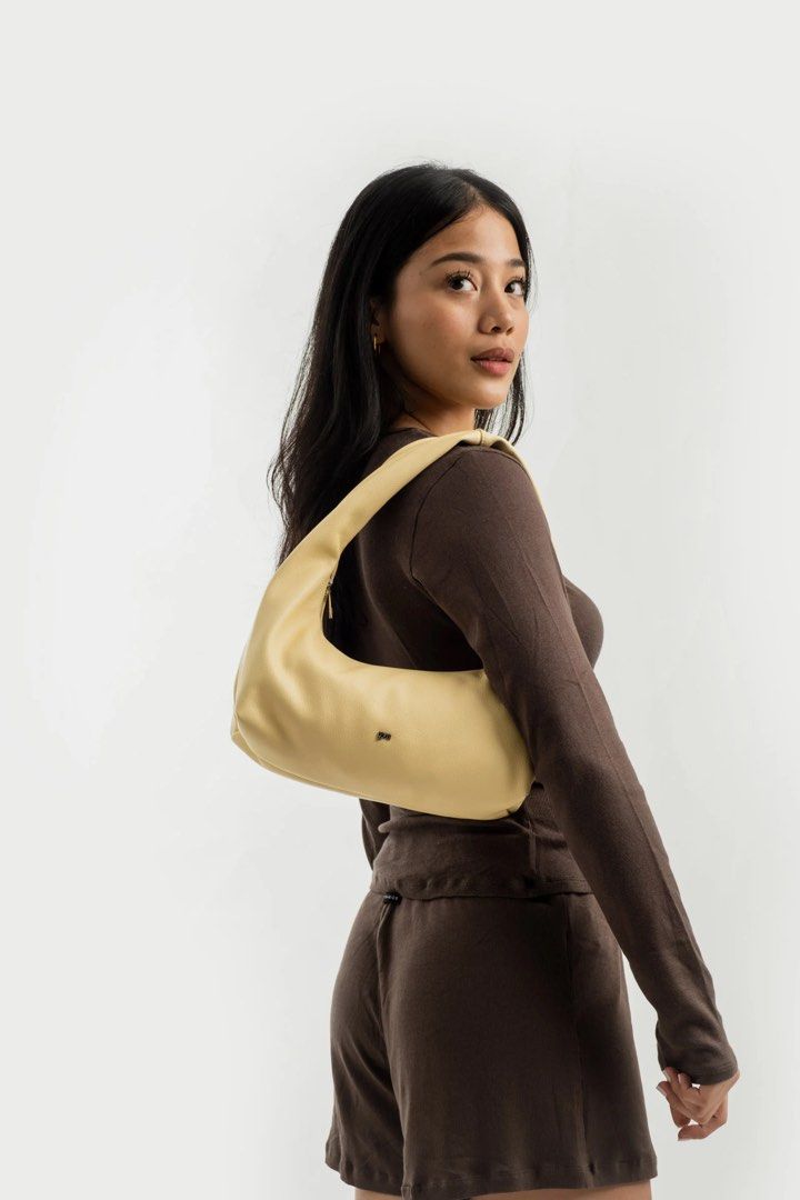 GVN Hobo Bag (Butter) (Category: Shoulder Bags) located in Manila. Submitted by kookievernon_ (Listing ID 1439526337, Image 2). Description: - Good condition - color: Butter - spacious.