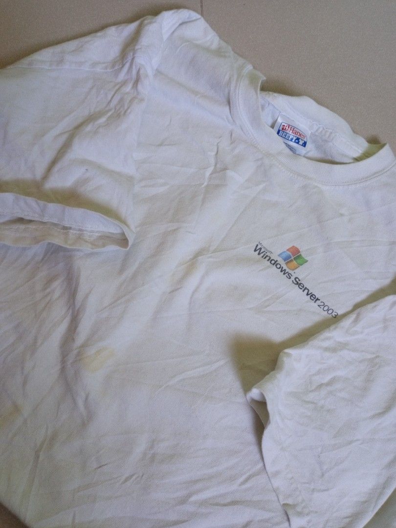 Hanes Windows Server 2003 Training Tour T-shirt (Category: Tshirts & Polo Shirts ) located in Manila. Submitted by onewikstraight (Listing ID 1439467642, Image 1). Description: - Vintage Hanes Beefy-T T-shirt - From the Windows Server 2003 Training Tour - Features the Windows Server 2003 logo on the front - Training tour design on the back - Back design highlights scalability and "Do more with less" - Classic white color - Size XL - Perfect for c