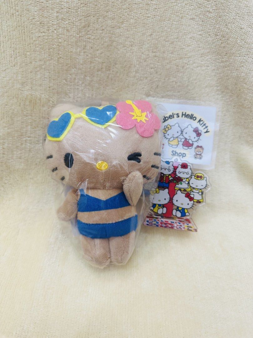 Hello Kitty Beach Plush Toy (Category: Plushies & Soft Toys) located in Angeles City. Submitted by IsaCRSL (Listing ID 1439453892, Image 1). Description: - Adorable Kitty plush toy. - Features Kitty in a swimsuit, sunglasses, and a flower. -100% from Japan brand new with paper tag 100% free shipping .