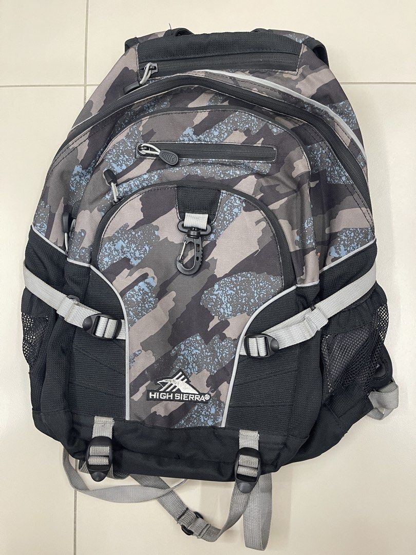 High Sierra Backpack Camo Print - Loop Backpack - Graffiti Black Ash Color - Travel Backpack (Category: Backpacks) located in Manila. Submitted by shopandscore (Listing ID 1439592909, Image 1). Description: Needs cleaning but all zipper and actual bag with good condition - High Sierra backpack with camo print - 33-liter capacity - Multiple zippered compartments - Side mesh pockets - Adjustable straps - Front attachment clip - Adjustable side comp