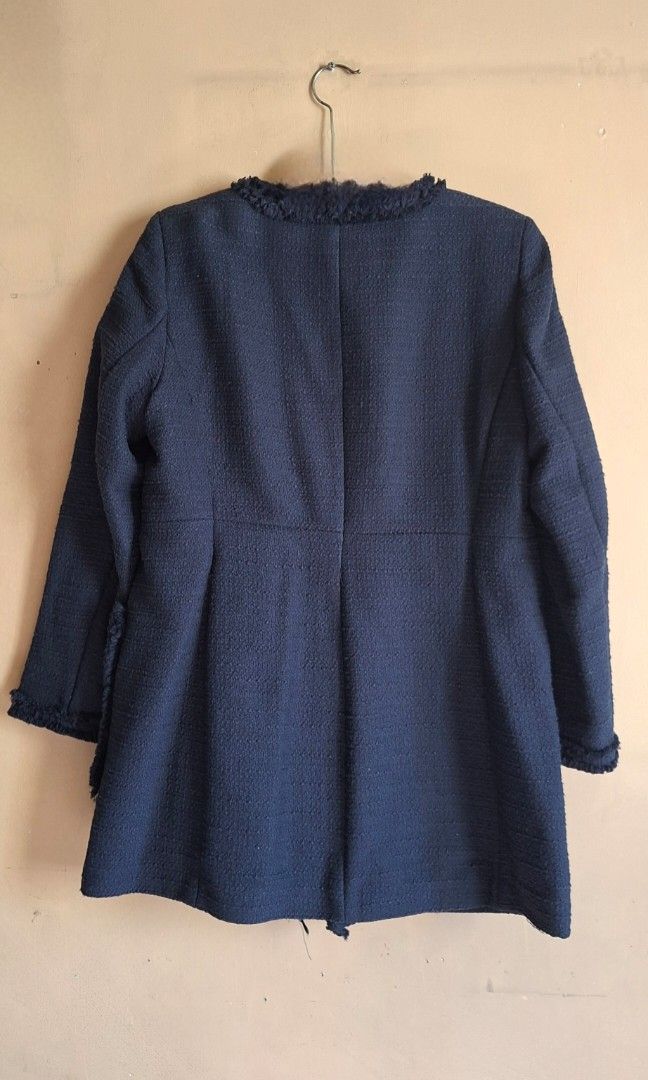 H&M Navy Blue Tweed Coat (Category: Coats, Jackets and Outerwear) located in Manila. Submitted by thrifter_lifestyle (Listing ID 1439422297, Image 2). Description: Brand: H&M Full gold zipper enclosure Raw frayed design including in collar, wrists Two big pockets in front Falls long, lands within hip area. L: 32.5" B: 42" W: 38" Color: Navy Blue Material: See tag, tweed material outer with navy lining Style is a cross between a blazer and coat 🙂
