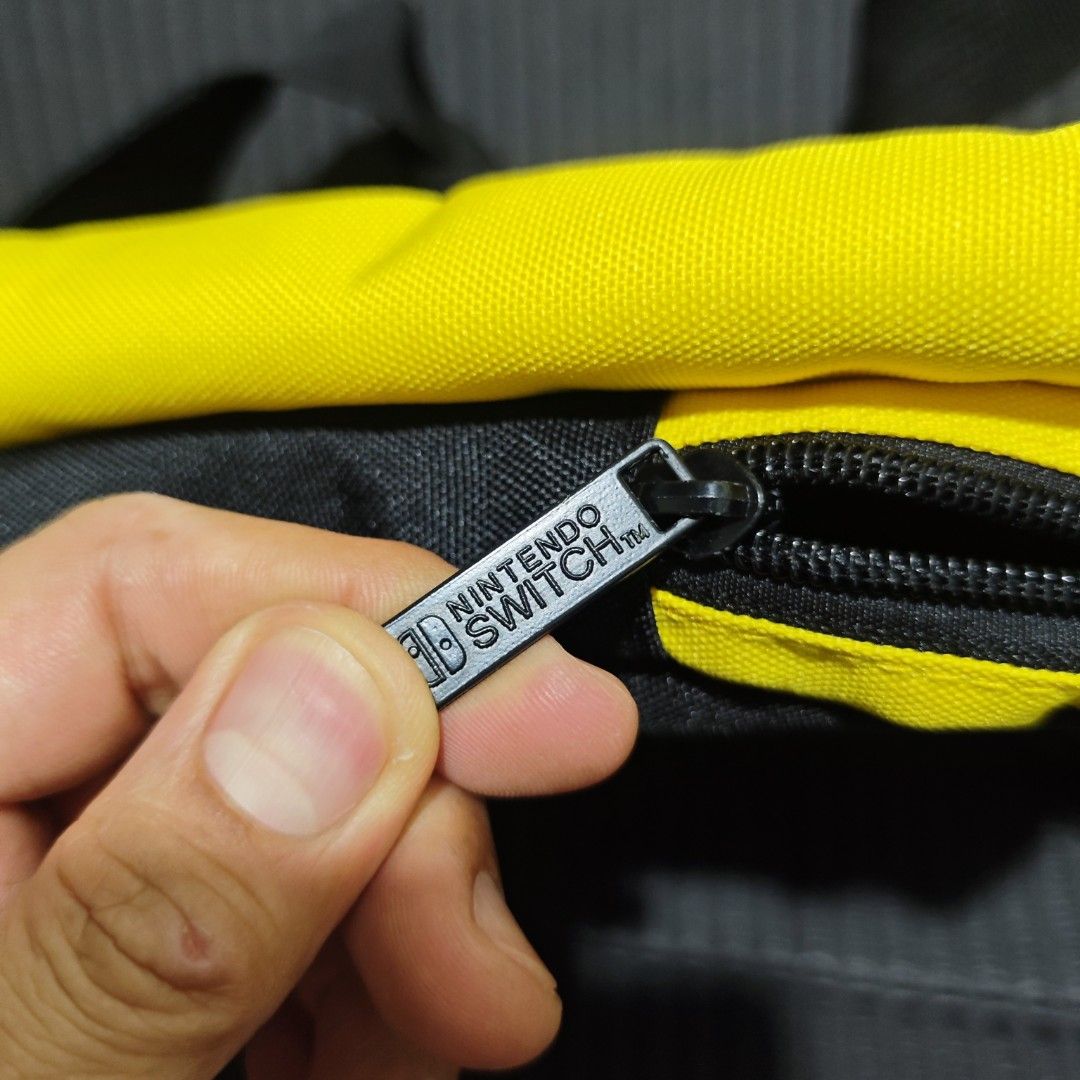 HORI NSW Adventure Pack Pikachu for NINTENDO SWITCH/SWITCH LITE (Category: Cases & Covers) located in Quezon City. Submitted by shopme_gadget30 (Listing ID 1439579146, Image 3). Description: Read the description Take your gaming set wherever the road leads, with the Adventure Pack by Hori. It's built to mobilize all the accessories you need to take your Switch or Switch Lite experience anywhere your Switch, dock, charger and other accessories wil