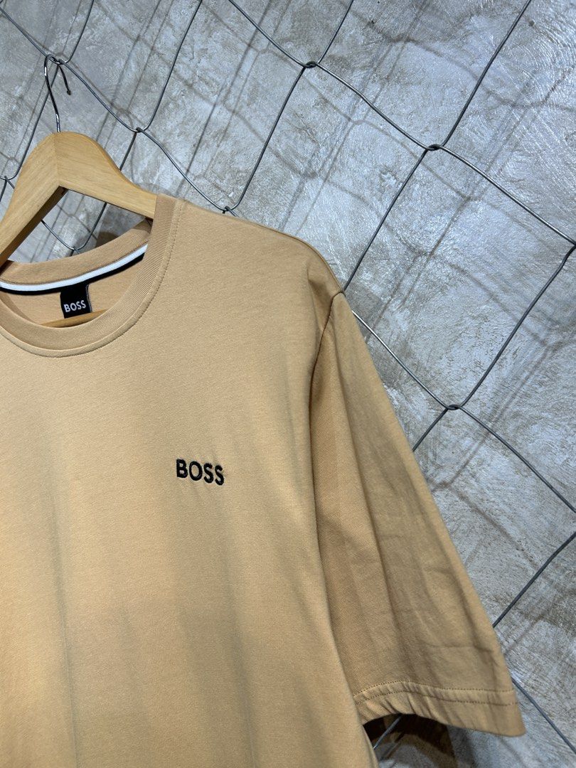 Hugo Boss T-shirt (Category: Tshirts & Polo Shirts ) located in Manila. Submitted by ardobe.mnl (Listing ID 1439467470, Image 3). Description: Boss Chest Logo Brown Tee. Size: Large-XL Dimes: 22x30 Condition: Good asnew Flaw: None! Mine: Dm to purchase! 📥.