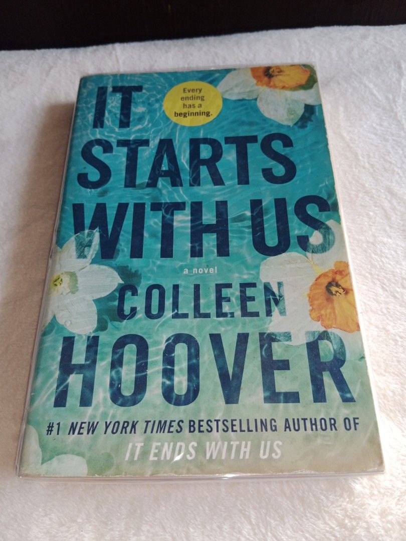 It Starts With Us by Colleen Hoover (Category: Storybooks) located in Manila. Submitted by angeloarce64172 (Listing ID 1439445162, Image 1). Description: - "It Starts With Us" by Colleen Hoover - Sequel to "It Ends With Us" - English language - Features a turquoise cover with floral accents - Brand new, in original packaging.