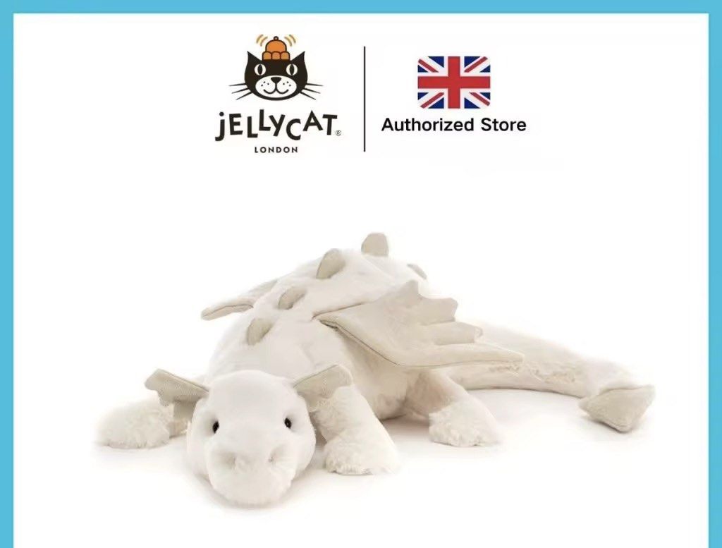 Jellycat White Dragon Stuffed Toy (Category: Plushies & Soft Toys) located in Caloocan City. Submitted by clevermoon.6d660c (Listing ID 1439508040, Image 1). Description: - Jellycat dragon plush toy - Soft, white fur - Detailed wings and friendly face - Includes a free blue Jellycat dust bag - Perfect for cuddling or decoration - Ideal gift for any occasion.