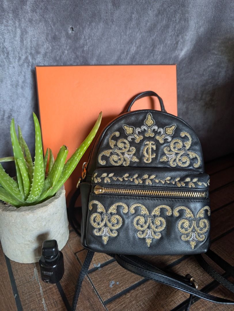 Juicy Couture Black Label Leather Backpack Sling Bag (Category: Backpacks) located in San Carlos. Submitted by khaisser07 (Listing ID 1439565701, Image 1). Description: Leather mini backpack , black label from Juicy Coutureee, can be converted to crossbody sling bag Price 2500 shipped .