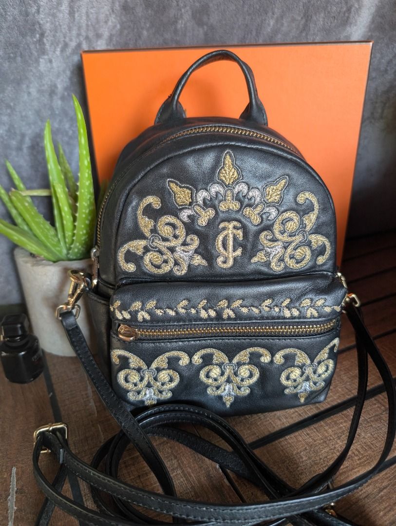 Juicy Couture Black Label Leather Backpack Sling Bag (Category: Backpacks) located in San Carlos. Submitted by khaisser07 (Listing ID 1439565701, Image 3). Description: Leather mini backpack , black label from Juicy Coutureee, can be converted to crossbody sling bag Price 2500 shipped .