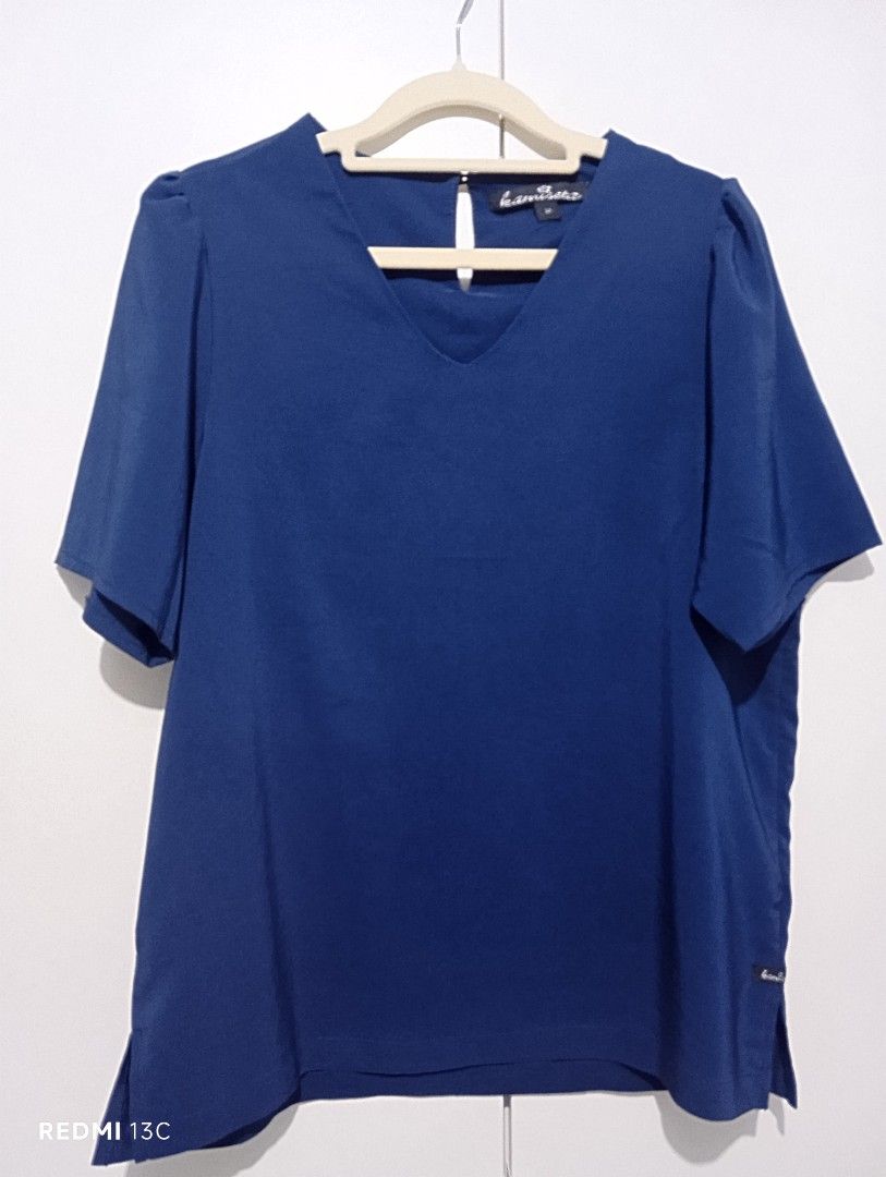Kamiseta Navy Blue Blouse - Size L (Category: Blouses) located in Manila. Submitted by khrodi (Listing ID 1439494151, Image 1). Description: - Kamiseta navy blue blouse - Size: L1 - Features a V-neckline - Short sleeves - Keyhole detail at the back - Made of smooth, lightweight fabric - Suitable for casual and office wear - brand new, washed, no tag.