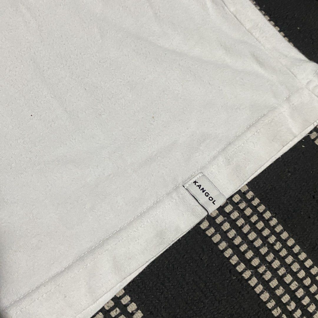 Kangol White T-Shirt (Category: Tshirts & Polo Shirts ) located in Gapan. Submitted by thrftfnds (Listing ID 1439464181, Image 3). Description: 💎 KANGOL DIMES: 19x27 COLOR RATE: 9/10 FLAWS: LINTS & STAINS PRICE: 300+SF.