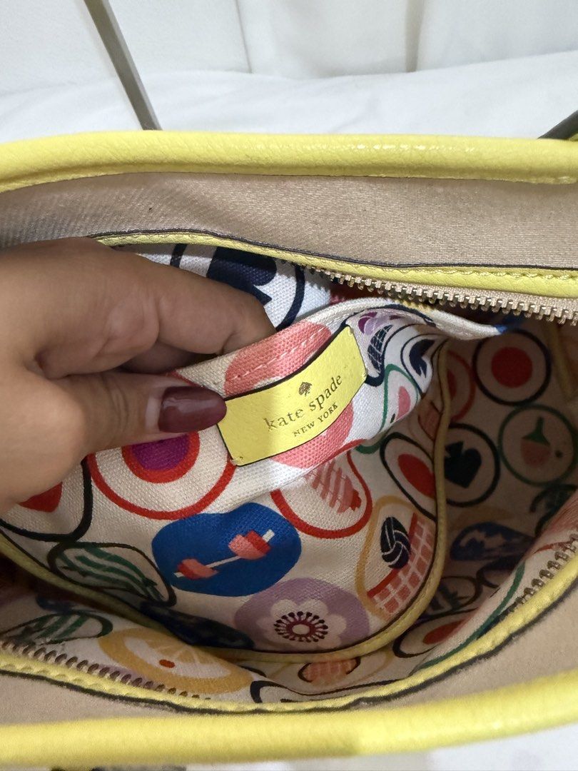 Kate Spade New York Tote Bag (Category: Tote Bags) located in Consolacion. Submitted by mrshoarderrr (Listing ID 1439538598, Image 3). Description: Issue Small stains in patent leather and corner scuffs Small size no sling Authentic .