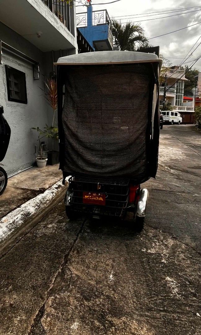 KUDA EBIKE (Category: Motorbikes for Sale) located in Manila. Submitted by happyrabbit-ff11 (Listing ID 1439594191, Image 3). Description: KUDA 3wheels Good condition Kakapalit lang battery last month With seat cover With waterproof curtain Rfs: Upgrade.