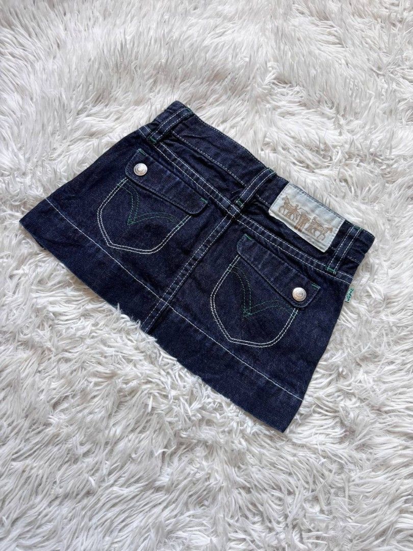 Levi's Denim Skirt Kids (Category: Babies & Kids Fashion) located in Catbalogan. Submitted by kristinapi (Listing ID 1439456871, Image 1). Description: - Levi's kids denim skirt - Dark blue wash - Size: 4-5 yrs old (110 cm) - White stitching details - Green accents on pockets - Classic 2-pocket design (front and back).