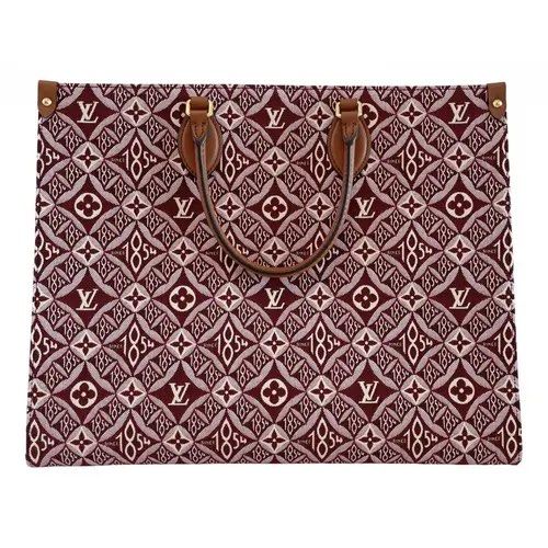 Louis Vuitton 1854 Tote Bag (Category: Luxury Bags & Wallets) located in Bacolod City. Submitted by luxebylia (Listing ID 1439545798, Image 1). Description: - Authentic Louis Vuitton Tote Bag - Features the iconic 1854 pattern - Brown leather handles - Detachable shoulder strap - Interior includes a tag with a QR code and "Made in France" - Serial number: M44576 Major declutter sale! Perfect for beach gala and school. super spacious! will give an