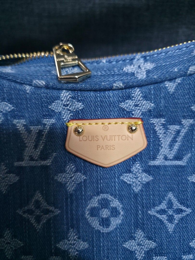 Louis Vuitton Denim Bag (Category: Luxury Bags & Wallets) located in General Trias. Submitted by roselle2230 (Listing ID 1439517993, Image 2). Description: - Authentic Louis Vuitton denim bag - Features the classic LV monogram - Includes a detachable coin purse - Gold zipper and leather accents - Adjustable strap - Interior tag code: GC9420.
