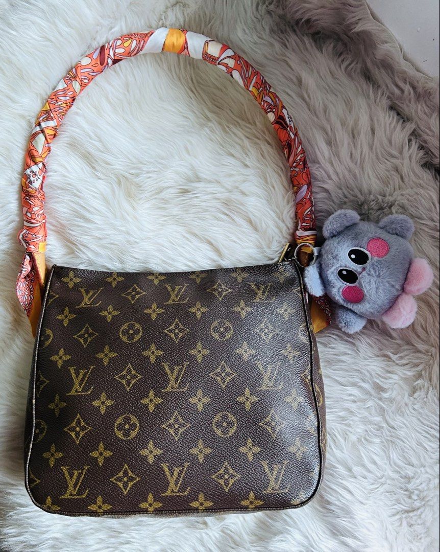 Louis Vuitton Looping MM Handbag with ENTRUPY (Category: Luxury Bags & Wallets) located in Quezon City. Submitted by mamamars1987 (Listing ID 1439534272, Image 3). Description: - Authentic Louis Vuitton Looping MM handbag - Excellent preloved condition - Includes Entrupy certificate - Includes dustbag and free bag organizer inside.