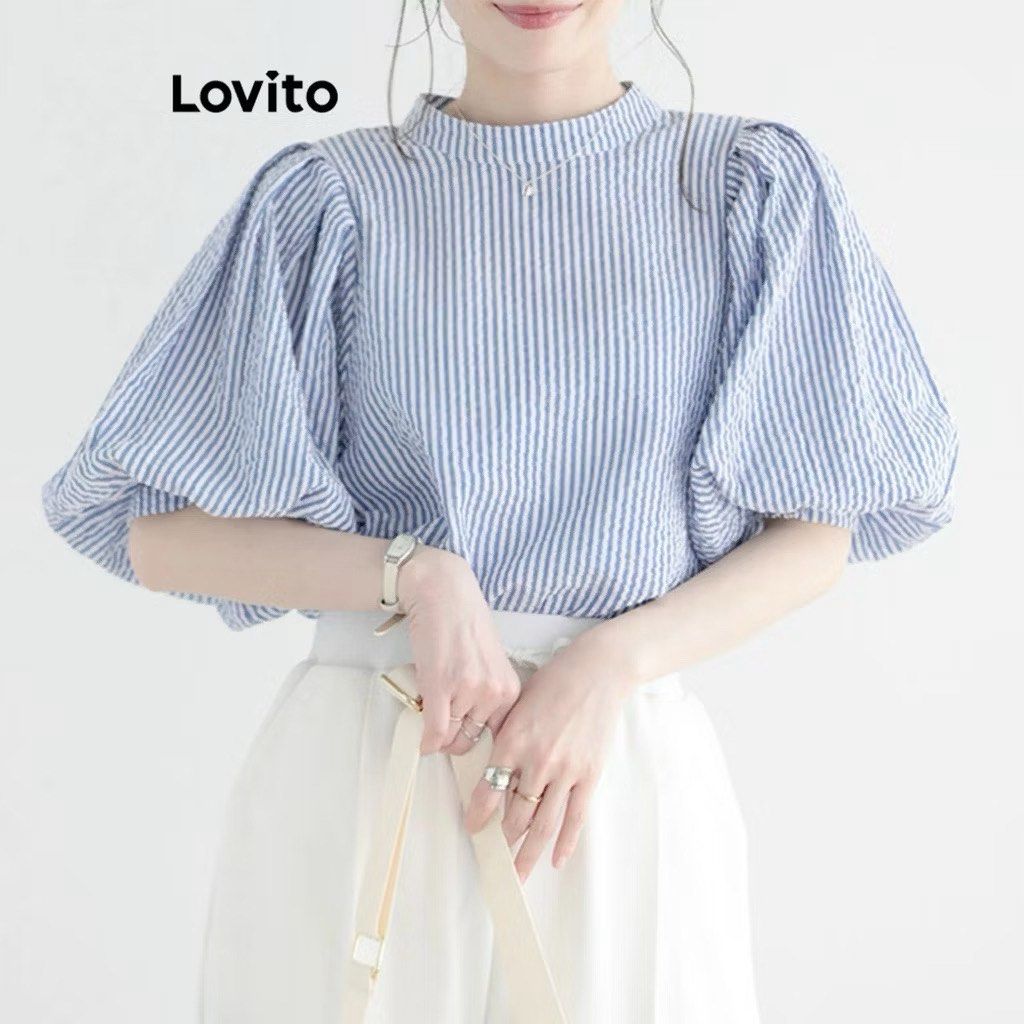 Lovito Light Blue Striped Puff Sleeve Top (Category: Blouses) located in Quezon City. Submitted by aki_dclttr (Listing ID 1439571185, Image 1). Description: never been used size too big for me.