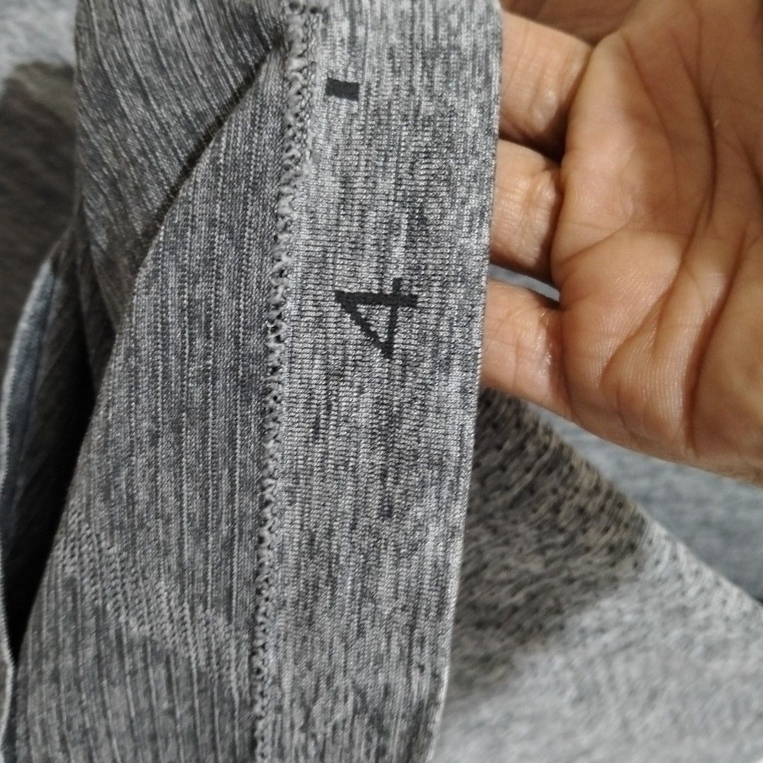 Lululemon Long Sleeve Shirt Size 4 (Category: Activewear) located in Subic. Submitted by tintindera (Listing ID 1439559456, Image 3). Description: - Lululemon long sleeve shirt - Size: 4 - Features: - Crew neck - Long sleeves - "YOU RACE YOU" and "START WHERE YOU ARE" printed on sleeves - Small logo on back.