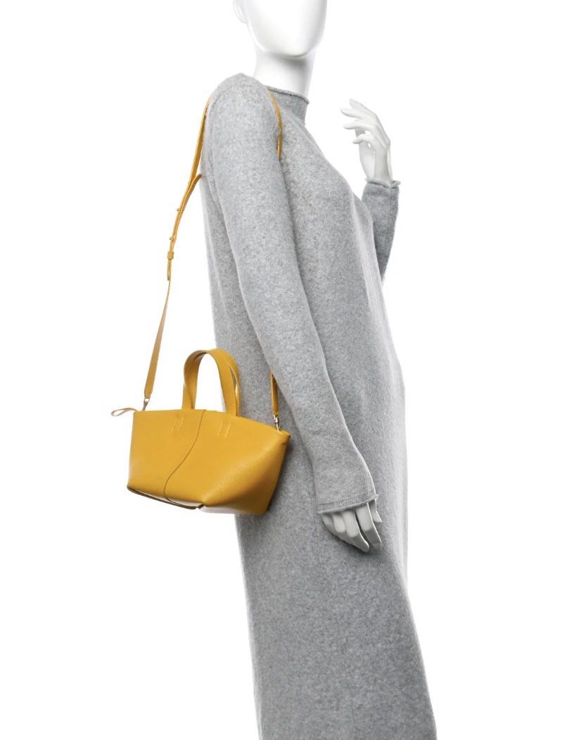 MANSUR GAVRIEL Mini Mango Yellow Tulipano Bag (Category: Luxury Bags & Wallets) located in Makati City. Submitted by scarwee (Listing ID 1439582716, Image 2). Description: Brandnew. No flaws Comes with detachable strap.