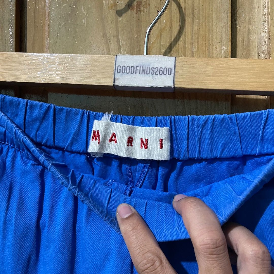 Marni Wide Leg Pants (Category: Luxury Apparel) located in Baguio. Submitted by goodfinds2600v2 (Listing ID 1439514774, Image 3). Description: Size on tag: L fits 28-34 waist via tape measure Dimensions: L- 34.5 Leg Opening- 14.5 Description: Unisex Condition: Very Good Issue/s: missing drawstrings .