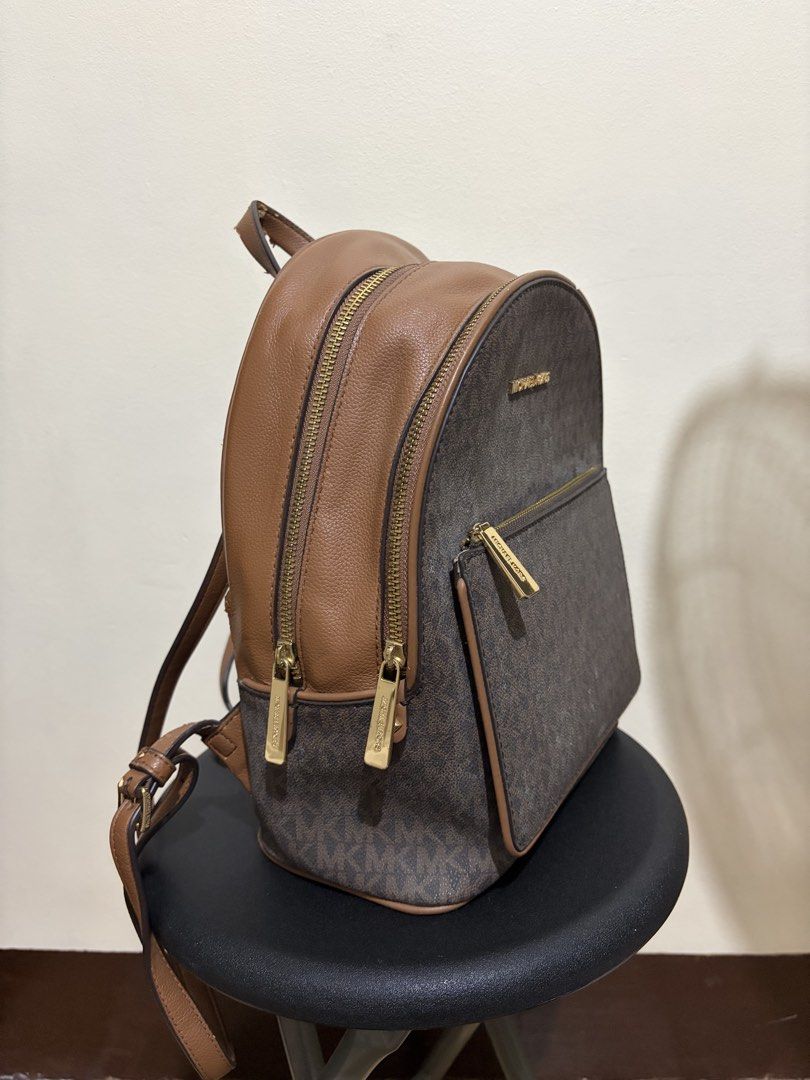 Michael Kors Adina Backpack (Category: Backpacks) located in Manila. Submitted by kiziah1234 (Listing ID 1439590226, Image 3). Description: - all zippers are still working - from the US (gifted to me) - rfs: not gonna use anymore - loc: mendiola, mnl - see photos for damages - open for nego :) .