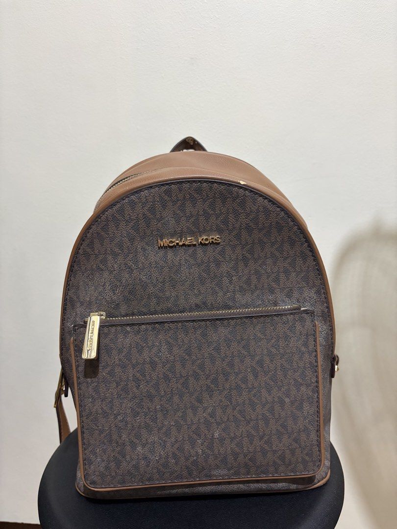 Michael Kors Adina Backpack (Category: Backpacks) located in Manila. Submitted by kiziah1234 (Listing ID 1439590226, Image 1). Description: - all zippers are still working - from the US (gifted to me) - rfs: not gonna use anymore - loc: mendiola, mnl - see photos for damages - open for nego :) .