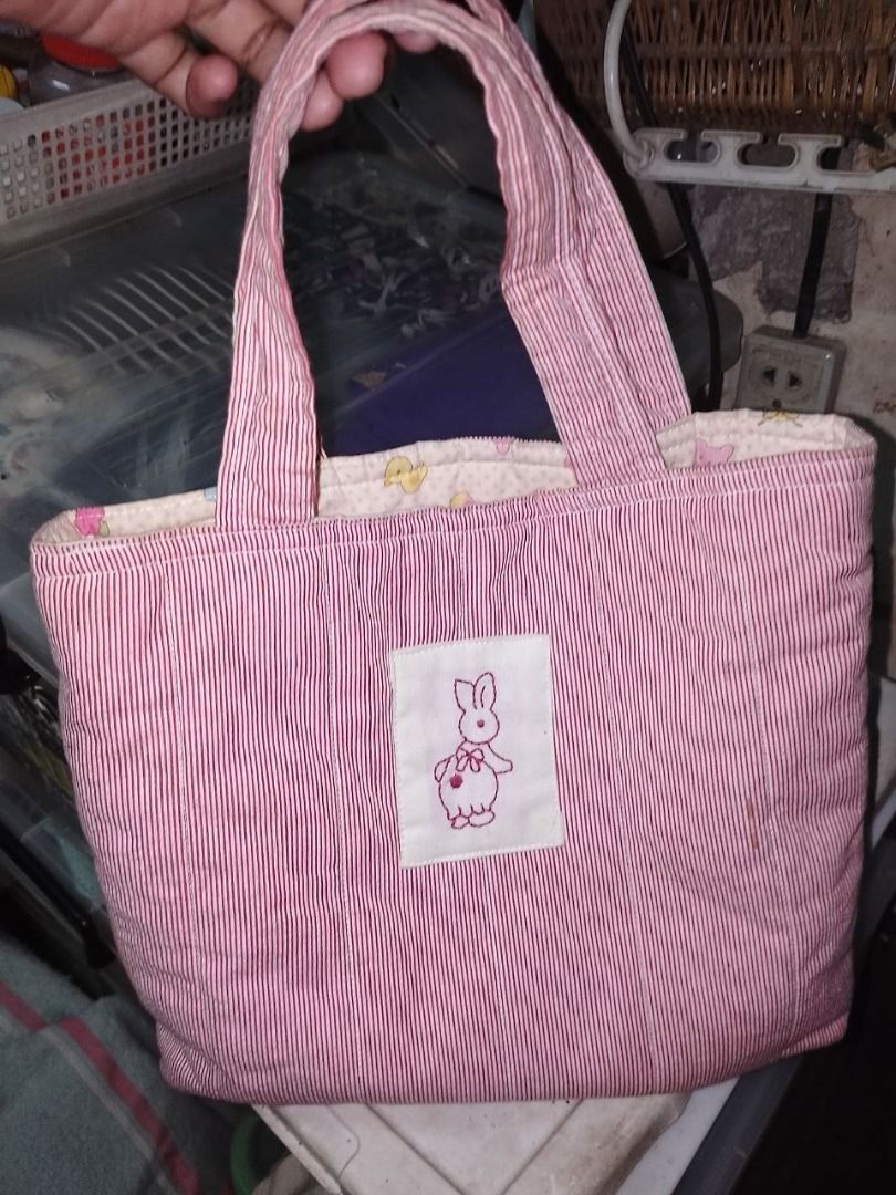 Miffy Canvas Embroidered Tote Bag (Category: Tote Bags) located in Quezon City. Submitted by akosiluna44 (Listing ID 1439573880, Image 1). Description: Preowned Good condition No etiketa but still good With open pocket inside the bag Cotton From Japan Can fit umbrella, long wallet, lunchbox, small books, notebooks, mobile phone, etc. ----------------- *Miffy is a little rabbit girl. Created by Dutch author and graphic designer Dick Bruna The Miff