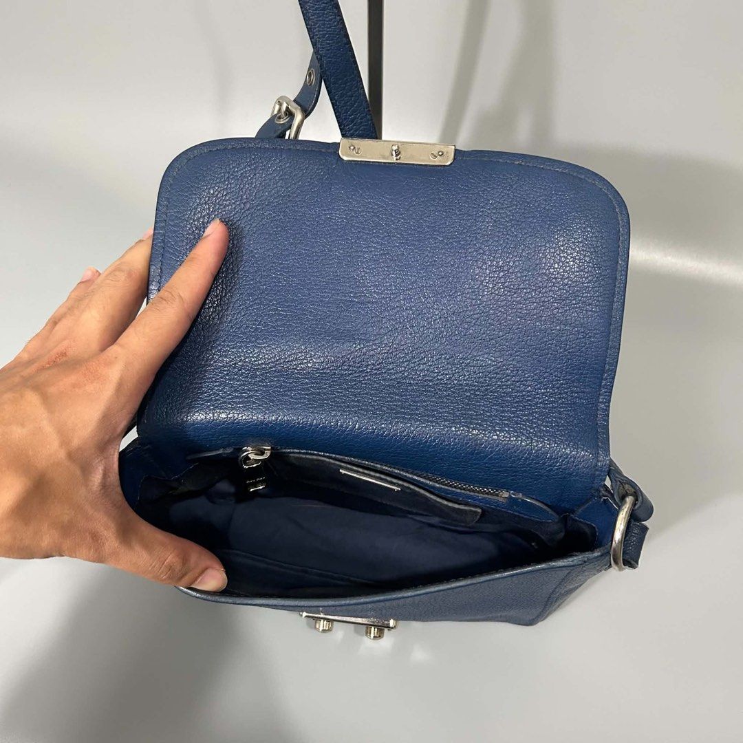 Miumiu Sling bag (Category: Luxury Bags & Wallets) located in San Pedro. Submitted by astron_15 (Listing ID 1439580829, Image 3). Description: Authentic Miumiu sling bag Rank A no issue at all Dior , gucci , louis vuitton.