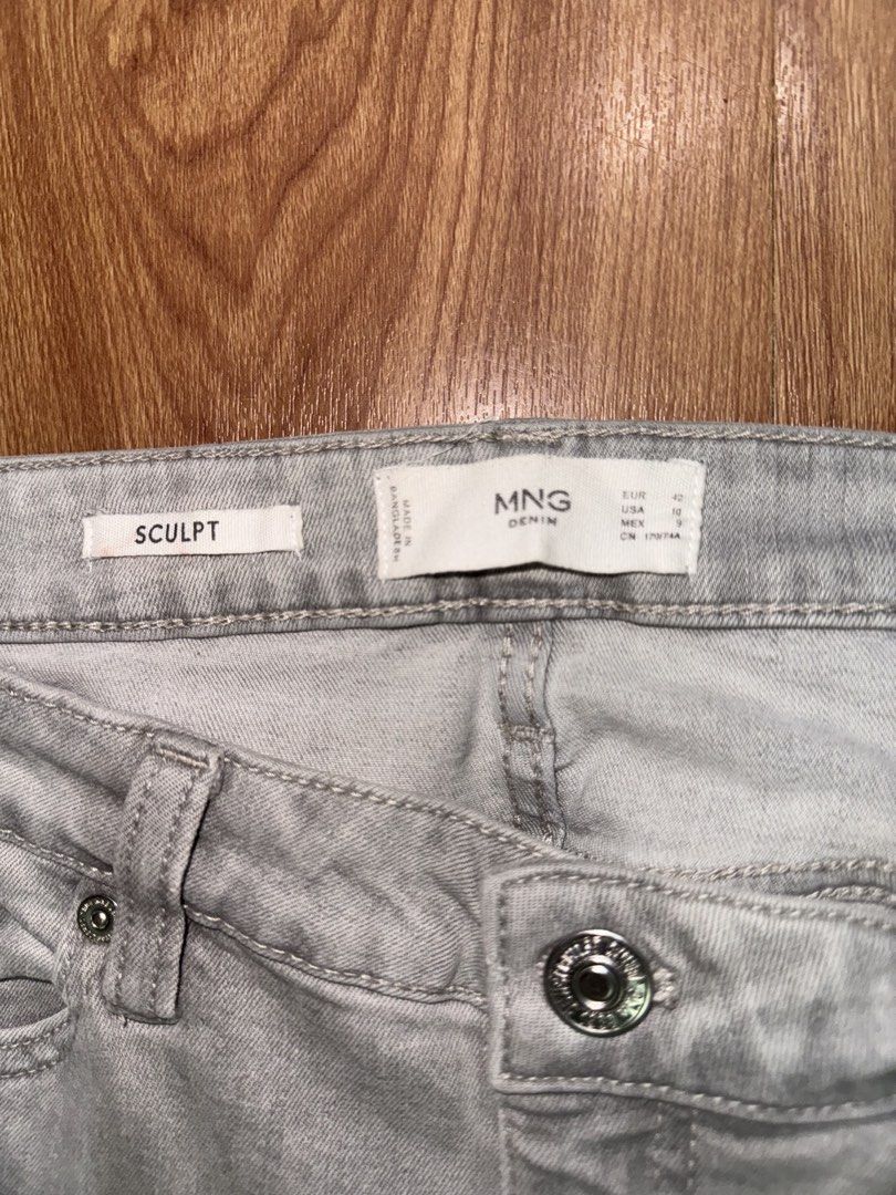 MNG Denim Sculpt Jeans (Category: Jeans) located in Quezon City. Submitted by mkcabling (Listing ID 1439517767, Image 3). Description: - MNG Denim Sculpt jeans - Light gray color - High-waisted - Button and zipper closure - Visible back pockets - Size: EUR 40 / USA 10 -RFS: Decluttering.