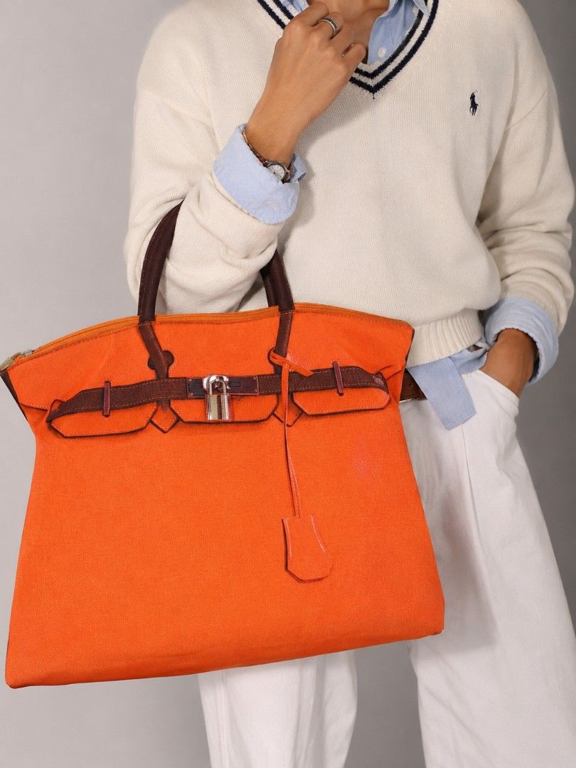 Mousse 3D Trompe-l'œil Canvas Tote (Category: Tote Bags) located in Baguio. Submitted by PreiLoveMaria (Listing ID 1439593151, Image 1). Description: Mousse Hong Kong 3D Trompe-l'œil Canvas Tote ​Add a playful twist to your daily style with this iconic 3D optical illusion bag from Mousse HK! It gives you the classic, elegant look of a luxury Birkin silhouette printed on a lightweight, casual canvas tote. Perfect for everyday use, travel, or as a 