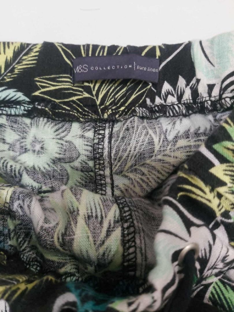 M&S Collection Pure Linen Skirt (Category: Shorts) located in Davao. Submitted by rosewyn (Listing ID 1439490438, Image 3). Description: - M&S Collection linen shorts - Tropical print design - Comfortable elastic waistband - Lightweight fabric, ideal for warm weather - Black base color - Green and yellow leaf patterns.