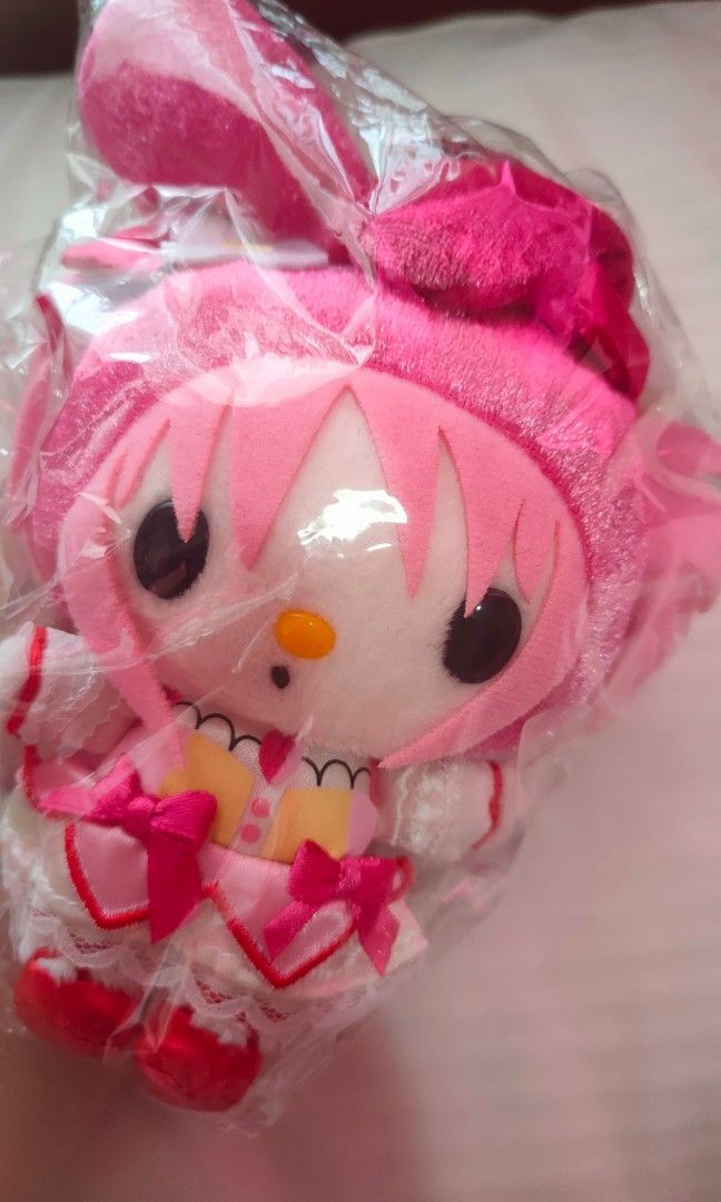 My Melody Madoka Plush Toy (Category: Plushies & Soft Toys) located in San Juan City. Submitted by raremountain_5de9b2 (Listing ID 1436908621, Image 3). Description: - Adorable My Melody plushie - Dressed as Madoka from Madoka Magica - Features a pink dress with bows and lace details - Includes pink hair and a white flower - Still in original packaging - Perfect for Sanrio and Madoka Magica fans and collectors.