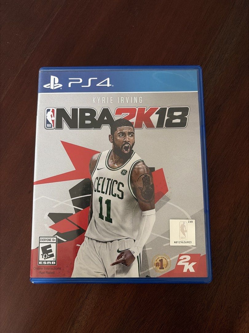 NBA 2K18 - PS4 (Category: PlayStation) located in Caloocan City. Submitted by whoisshio (Listing ID 1439487537, Image 1). Description: - NBA 2K18 for PlayStation 4 - Features Kyrie Irving on the cover - Rated E10+ by ESRB - Includes the 2K logo - Blue game case - Basketball simulation game.
