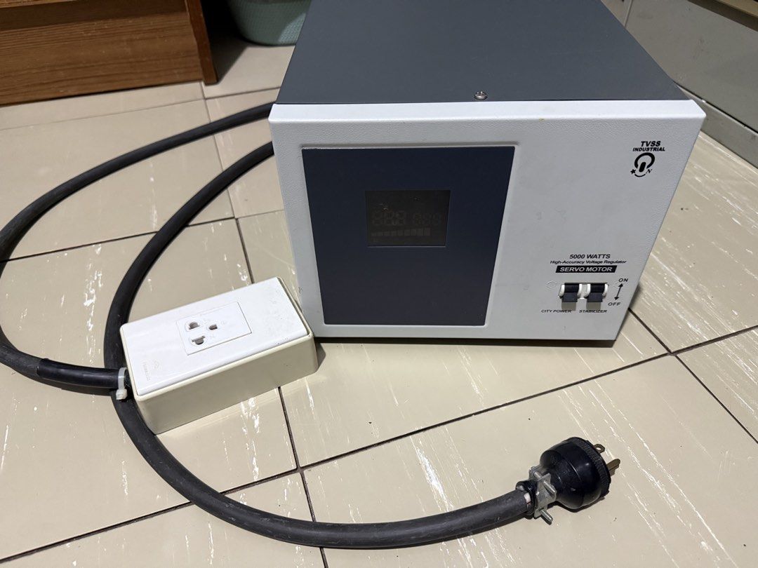 Newstar TVSS-5000 Servo Motor Voltage Regulator (Category: Electrical, Adaptors & Sockets) located in Muntinlupa City. Submitted by nicolo429.biz (Listing ID 1439590108, Image 3). Description: - Newstar TVSS-5000 Voltage Regulator - 5000 Watts Capacity - Digital Display - Output Voltage: 220V and 110V - Input Voltage: 180V-250V - Includes Power Cable - 220V Outlet Included - On/Off Switch - City Power/Stabilizer Switch.