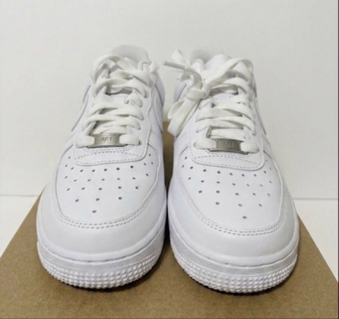 Nike Air Force 1 White Sneakers (Category: Sneakers) located in Cabanatuan. Submitted by scrlttt (Listing ID 1439499329, Image 1). Description: - Classic white Nike Air Force 1 sneakers - White leather upper - White laces - White sole - Features the iconic Nike design - Nike logo visible on the side - Includes the "AF1" metal tag - Timeless and versatile - used only 2x.