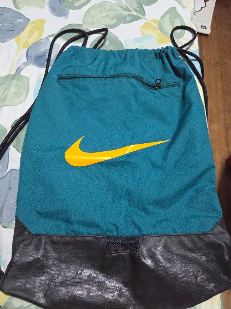 Nike Draw String Bag (Category: Backpacks) located in Quezon City. Submitted by panchie32 (Listing ID 1439576183, Image 1). Description: Selling my Nike drawstring bag bought from Sports Central SM Fairview last year. Used only around 2–3 times, so it’s still in very good condition. ✔ Lightweight and durable ✔ Clean and minimally used ✔ Perfect for gym, errands, or light travel RFS: Not comfortable for my back use , so I switched to a different b