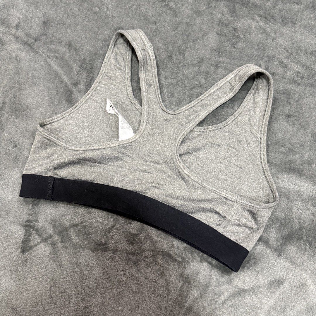NIKE DRIFIT SPORTS BRA (Category: Activewear) located in Santa Maria. Submitted by rarefindslt (Listing ID 1439486359, Image 3). Description: NIKE DRIFIT SPORTS BRA (SWIPE LEFT FOR MORE DETAILS..) S on tag in solid good condition rate! with tags for authenticity, solid gray color rate! mid swoosh print, stretchable material! can pass as new, no issue.