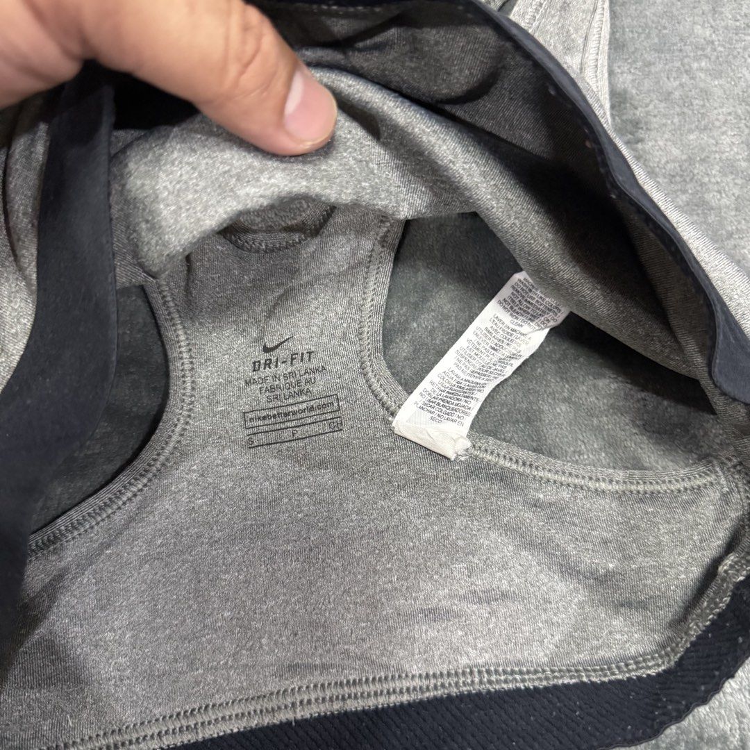 NIKE DRIFIT SPORTS BRA (Category: Activewear) located in Santa Maria. Submitted by rarefindslt (Listing ID 1439486359, Image 2). Description: NIKE DRIFIT SPORTS BRA (SWIPE LEFT FOR MORE DETAILS..) S on tag in solid good condition rate! with tags for authenticity, solid gray color rate! mid swoosh print, stretchable material! can pass as new, no issue.