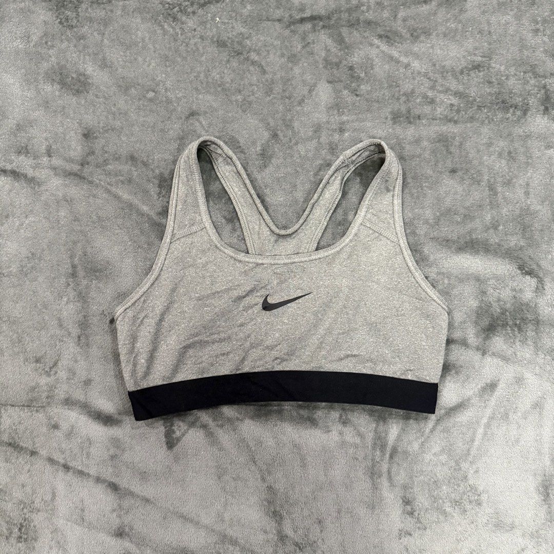 NIKE DRIFIT SPORTS BRA (Category: Activewear) located in Santa Maria. Submitted by rarefindslt (Listing ID 1439486359, Image 1). Description: NIKE DRIFIT SPORTS BRA (SWIPE LEFT FOR MORE DETAILS..) S on tag in solid good condition rate! with tags for authenticity, solid gray color rate! mid swoosh print, stretchable material! can pass as new, no issue.
