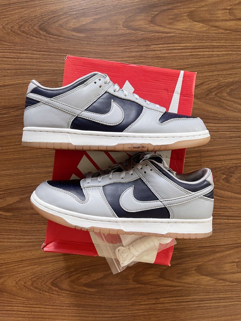 Nike Dunk low W 'College Navy Grey' (Category: Sneakers) located in Pasig City. Submitted by crewkicks.ph (Listing ID 1439589070, Image 2). Description: Dunk low W 'College Navy Grey' Size 12W / 10.5 US M Used 2x Complete OG ₱ 1,998 ONLY! FIRM.