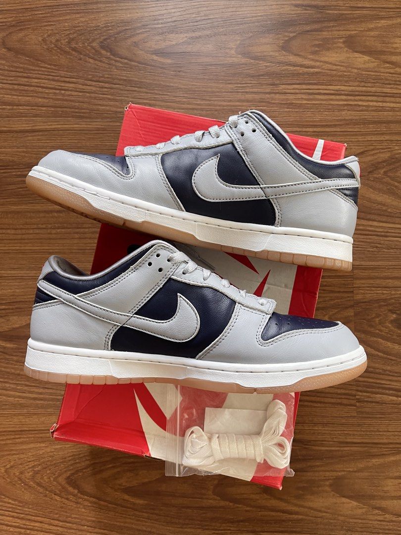 Nike Dunk low W 'College Navy Grey' (Category: Sneakers) located in Pasig City. Submitted by crewkicks.ph (Listing ID 1439589070, Image 3). Description: Dunk low W 'College Navy Grey' Size 12W / 10.5 US M Used 2x Complete OG ₱ 1,998 ONLY! FIRM.