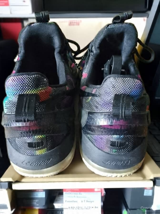 Nike LeBron 12 Low (Category: Sneakers) located in Caloocan City. Submitted by donflorald57310 (Listing ID 1439465187, Image 3). Description: - Nike LeBron 12 Low sneakers - Black upper with colorful design - Nike swoosh logo - Black laces - Visible air sole - Soles show some wear.