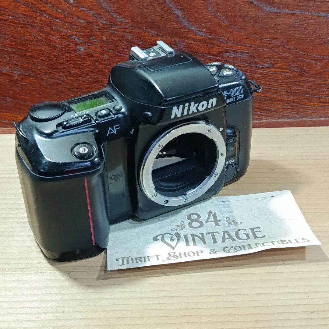 Nikon F-601 SLR Body (Category: Cameras) located in Las Pinas. Submitted by 84vintage (Listing ID 1439455739, Image 1). Description: One of the best Nikon SLR bodies that can use vintage Nikon lenses. Excellent tested condition.There is a mild prism issue na almost invisible common with these bodies due to age but not on the film path so no effect on film, just to be transparent. LCD looks good as in actual photos here. Sold as is where is only. 