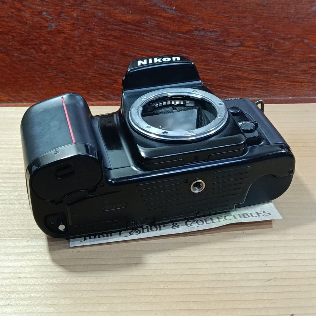 Nikon F-601 SLR Body (Category: Cameras) located in Las Pinas. Submitted by 84vintage (Listing ID 1439455739, Image 2). Description: One of the best Nikon SLR bodies that can use vintage Nikon lenses. Excellent tested condition.There is a mild prism issue na almost invisible common with these bodies due to age but not on the film path so no effect on film, just to be transparent. LCD looks good as in actual photos here. Sold as is where is only. 