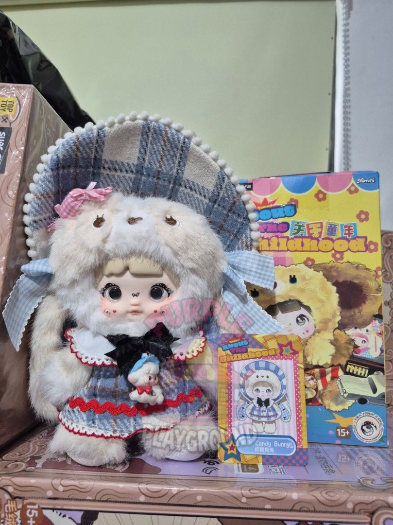 NOMMI ABOUT CHILDHOOD SECRET (Category: Designer & Blind Box Toys) located in Cabuyao City. Submitted by purpleplayground (Listing ID 1439505969, Image 1). Description: NOMMI V12 SECRET - With card only Note: Back part of the collar has some stain but overall condition of the doll is okay. Can send some pics!.