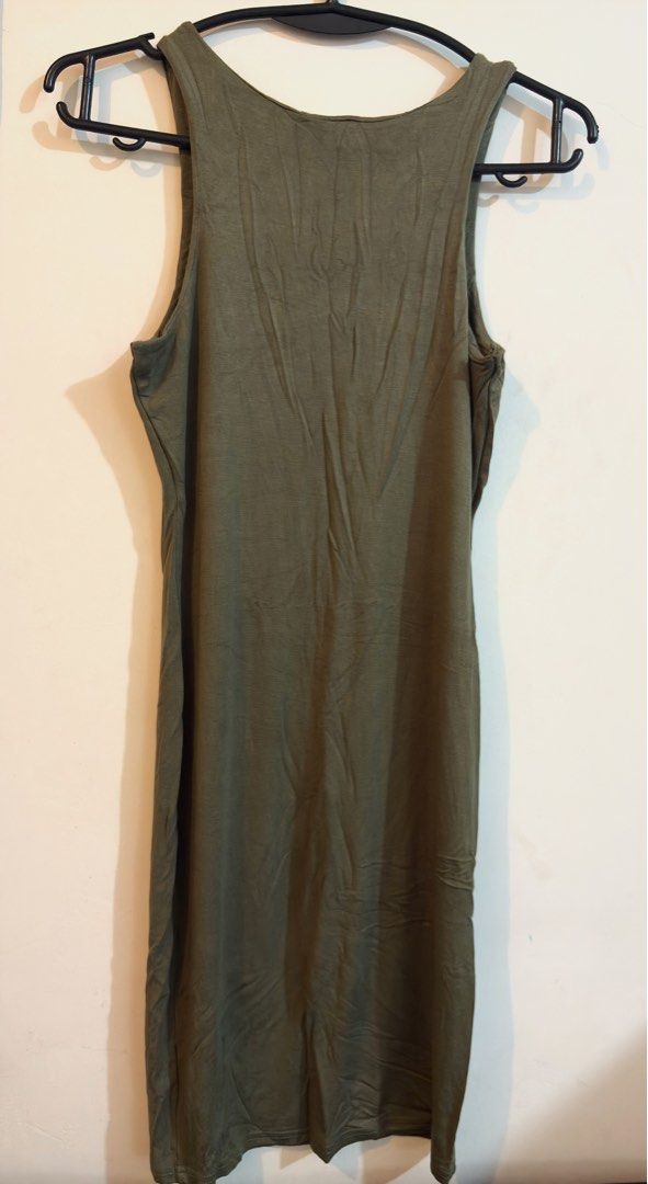 Olive Green Bodycon Dress (Category: Dresses) located in Quezon City. Submitted by mae_iggy (Listing ID 1439493305, Image 1). Description: - Olive green bodycon dress - Sleeveless design - Scoop neckline - Made of soft, stretchy fabric - Fitted silhouette - Knee-length - Perfect for casual wear or layering.