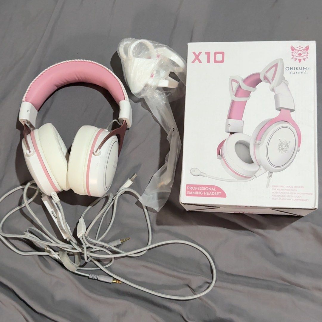 Onikuma X10 Professional Gaming Headset (Category: Headphones & Headsets) located in Pasig City. Submitted by 1uvmails (Listing ID 1439497996, Image 1). Description: Onikuma X10 Gaming Headset - unused mic jack & detachable cat ears - only used twice - rfs: not using my pc for gaming na ₱500 (bought for ₱680) mop: gcash / gotyme (no cod) mod: jnt / lalamove loc: pasig.