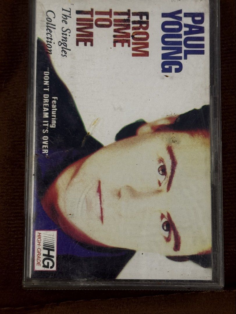 Paul Young - From Time To Time: The Singles Collection (Category: CDs & DVDs) located in San Juan City. Submitted by redgecollection (Listing ID 1439605992, Image 1). Description: FOR NEW WAVE COLLECTOR ERA 1980’s - Paul Young's "From Time To Time: The Singles Collection" cassette tape. - Includes hit songs: "Everytime You Go Away", "Come Back and Stay", and "Love of the Common People". - Features tracks from both sides of the cassette. - Manufac