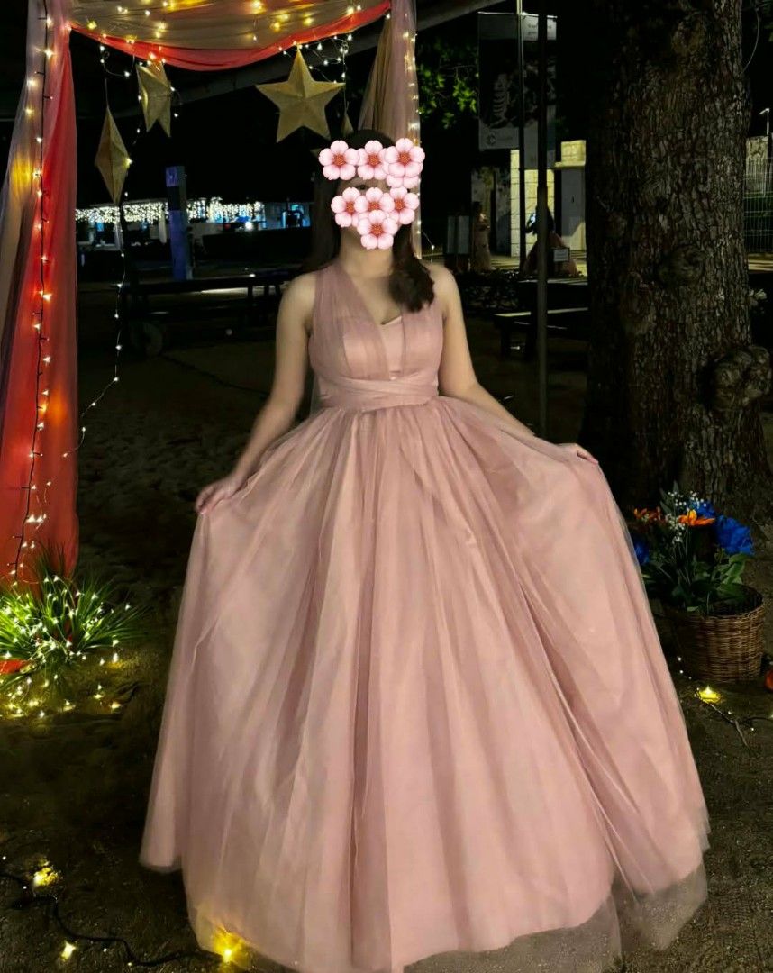 Pink Formal Gown (Category: Evening dresses & gowns) located in Makati City. Submitted by anna.q (Listing ID 1439534372, Image 1). Description: - Elegant pink formal gown - Halter neckline - Floor-length skirt - Made of soft, sheer fabric - Romantic and ethereal look - Perfect for prom, weddings, or formal events - Fitted bodice - Full skirt -Four (4) item available on-hand (Small to Medium) -Orig price: 1200 -Model fitting: Height- 5flat Bust- 3