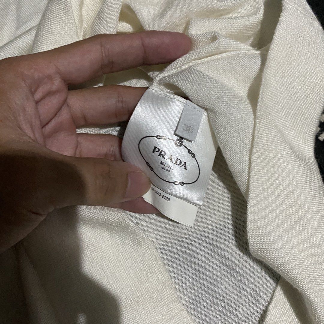 Prada Milano White T-shirt (Category: Tshirts & Polo Shirts ) located in Gapan. Submitted by thrftfnds (Listing ID 1439463926, Image 3). Description: 💎 PRADA MILANO DIMES: 15.5x22.5 COLOR RATE: 10/10 FLAWS: WASHABLE MINOR STAIN PRICE: 600+SF.