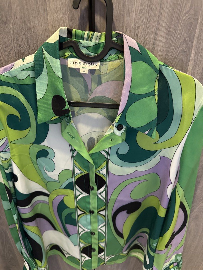 Printed Green Top and Skirt Set (Category: Sets or Coordinates) located in Taguig. Submitted by kittychum (Listing ID 1439582461, Image 2). Description: SOLD AS SET - LYW WOMAN top and skirt set - Top: Size Small, button-down, long sleeves (fits Medium) - Print: Green, purple, and white - Skirt: Matching print and design - Skirt Size: Large.
